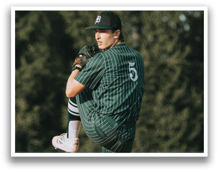 A baseball player in a green and white uniform is in the process of throwing a ball. Description generated by AI