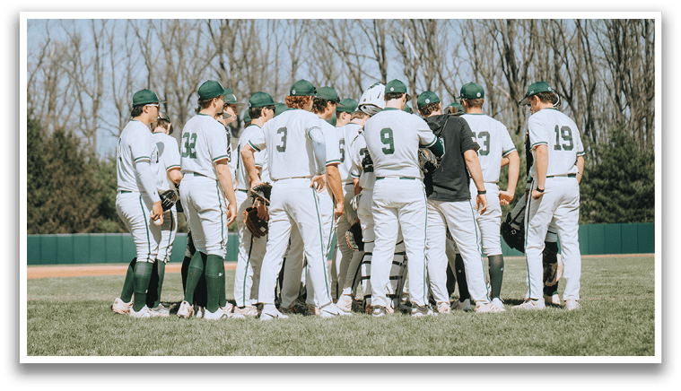Baseball players sitting on bench. Description generated by AI