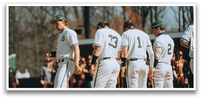 Baseball players standing on the field. Description generated by AI