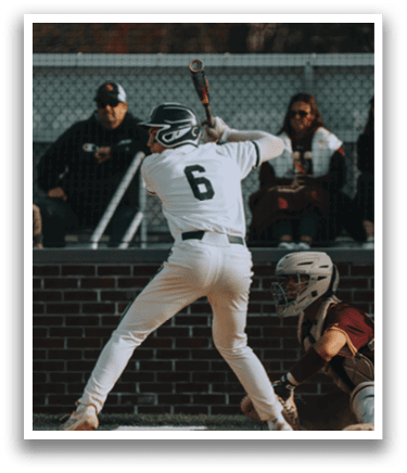 A baseball player is swinging a bat at a ball. Description generated by AI