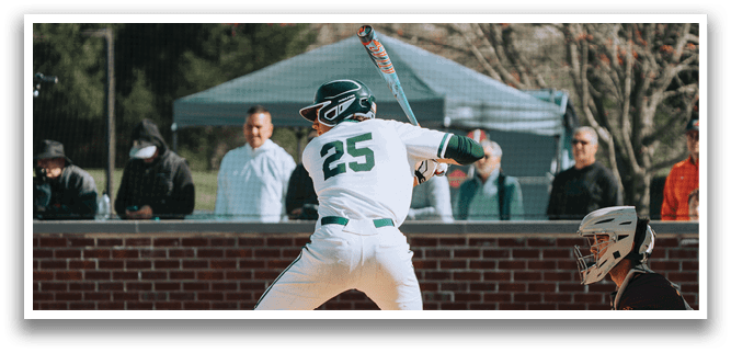 A baseball player is swinging a bat at a ball. Description generated by AI