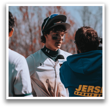 A baseball player wearing a black and white uniform. Description generated by AI