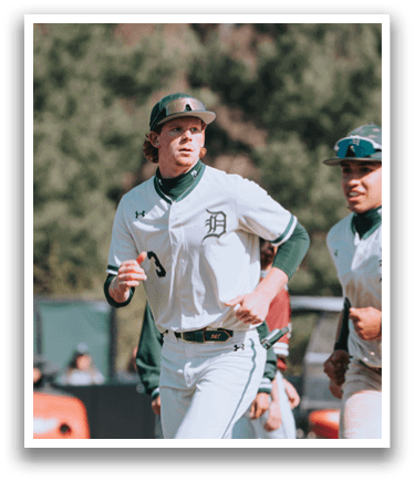 A baseball player running on the field. Description generated by AI