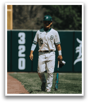 A baseball player with the number 11 on his jersey. Description generated by AI