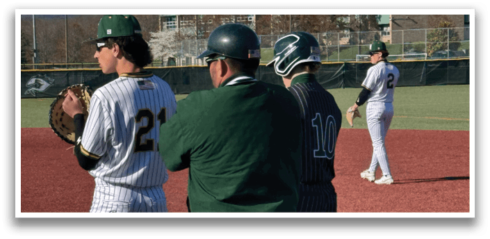 A baseball player wearing a green and white uniform. Description generated by AI