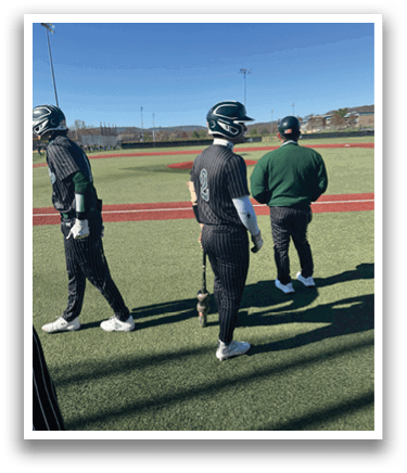 Three baseball players walking on a field. Description generated by AI