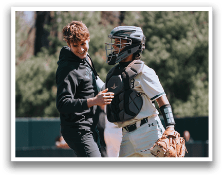 Two men playing baseball. Description generated by AI