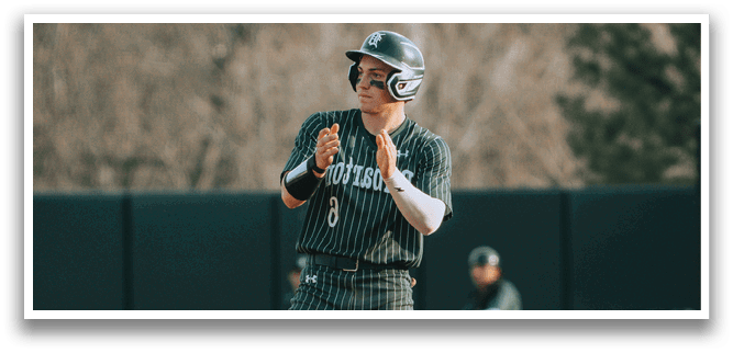 A baseball player is standing on home plate. Description generated by AI