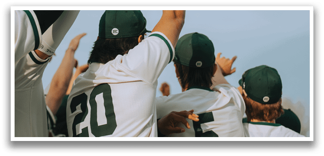 A group of people wearing green and white baseball caps. Description generated by AI