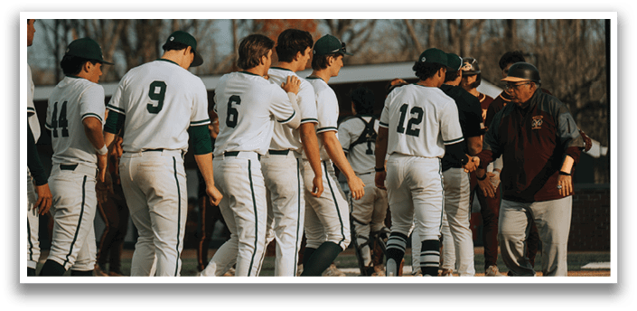 Baseball players wearing white uniforms. Description generated by AI