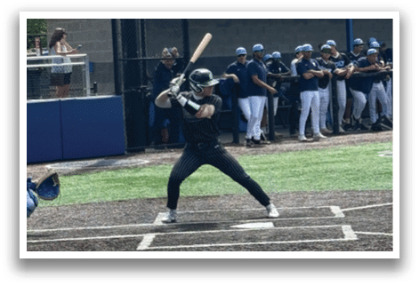 A baseball player is swinging a bat. Description generated by AI