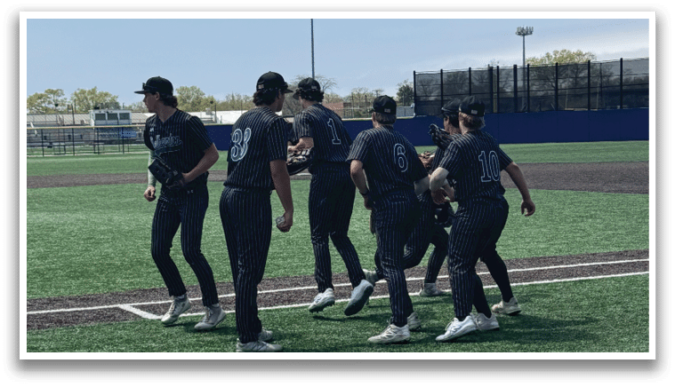 A group of people standing on a field. Description generated by AI