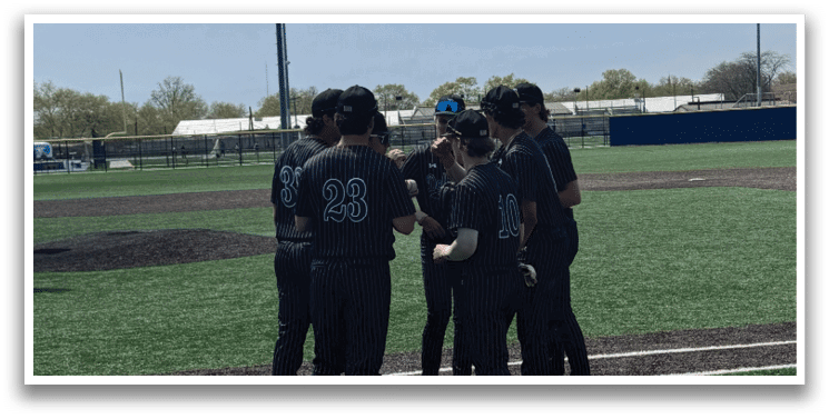 A group of baseball players standing on a field. Description generated by AI
