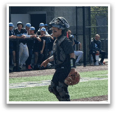 A baseball player wearing a catcher's mitt. Description generated by AI