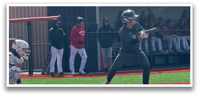 A baseball player is swinging a bat at a ball. Description generated by AI