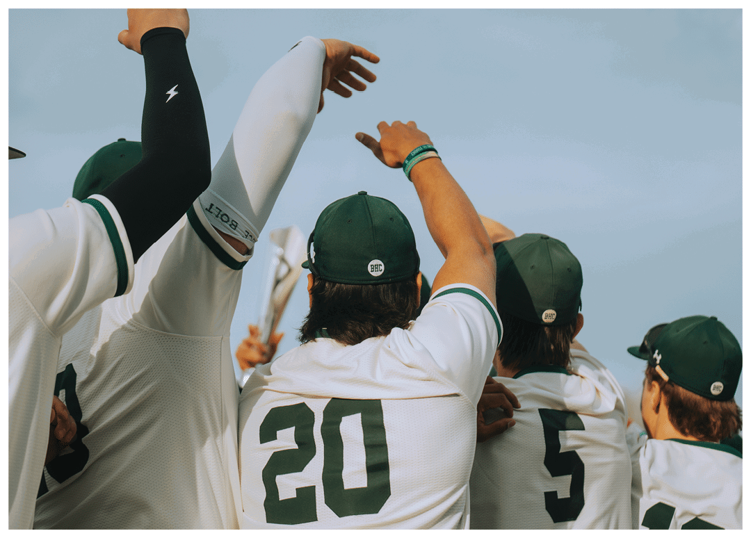 A man holding a trophy. Description generated by AI