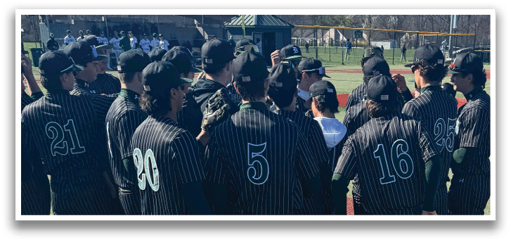 A group of baseball players standing on a field. Description generated by AI