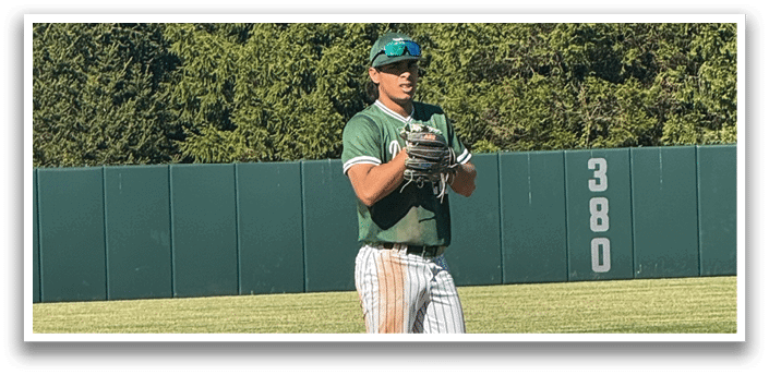 A baseball player is standing on the field. Description generated by AI