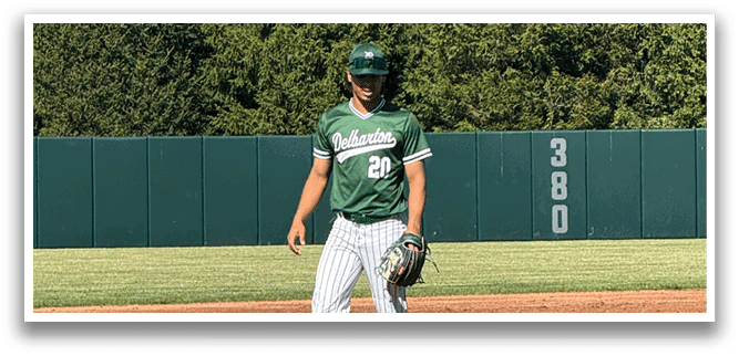 A baseball player standing on the field. Description generated by AI