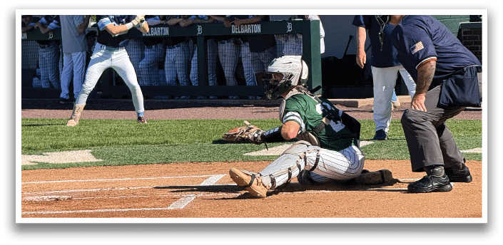 A baseball player sliding into a base. Description generated by AI