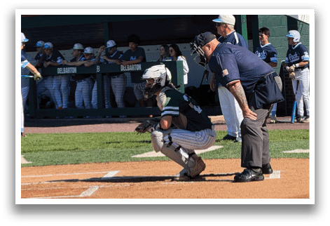 A baseball game is taking place with a batter, catcher, and umpire. Description generated by AI