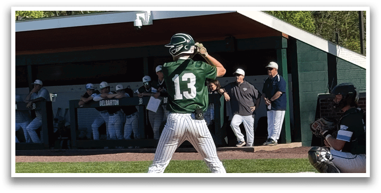 A baseball player is swinging a bat at a ball. Description generated by AI