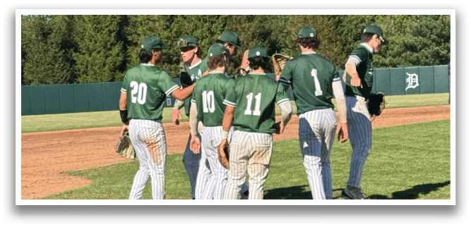 A group of baseball players on a field. Description generated by AI