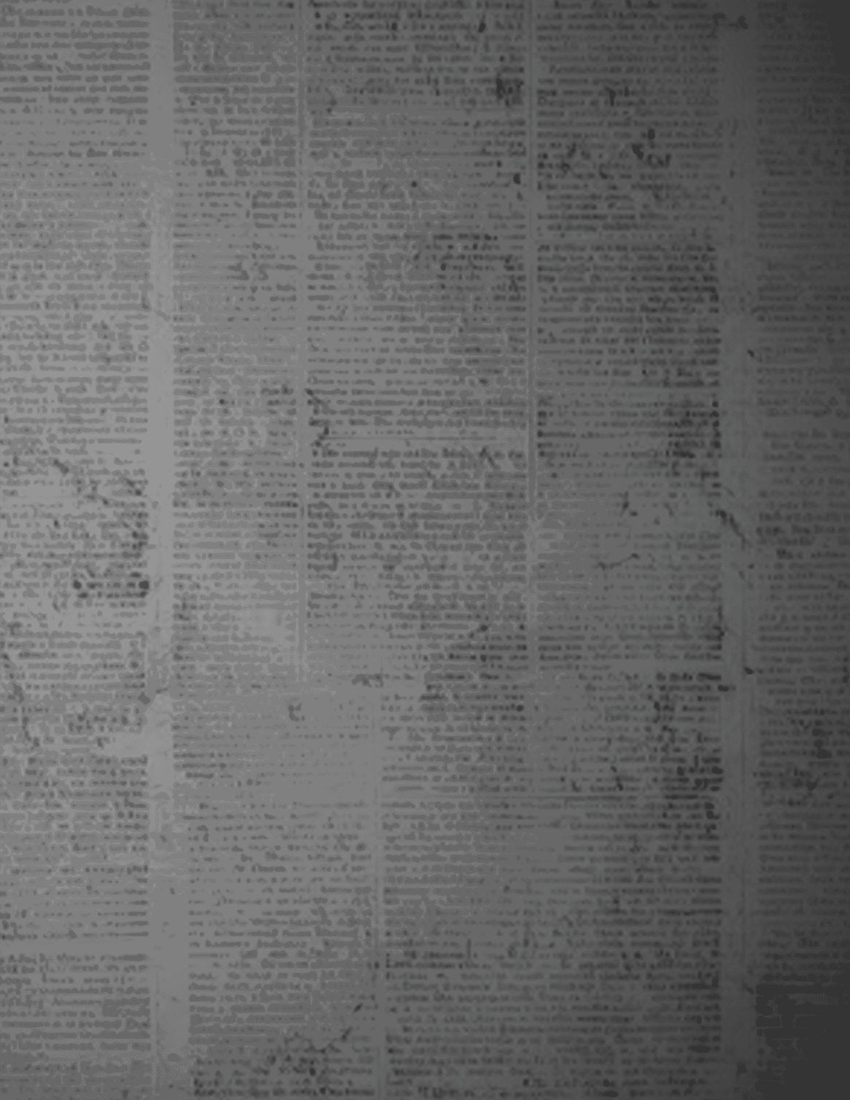 A newspaper with a lot of writing on it. Description generated by AI