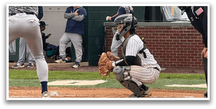 A baseball player is swinging a bat at a ball. Description generated by AI