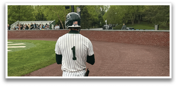 A baseball player wearing a number 1 jersey. Description generated by AI