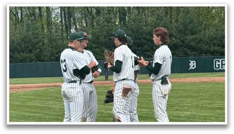 A group of baseball players standing on a field. Description generated by AI