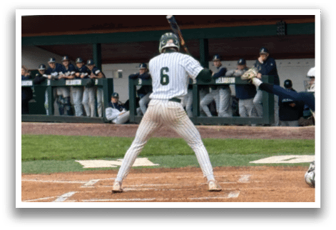 A baseball game is taking place with a batter, catcher, and umpire. Description generated by AI