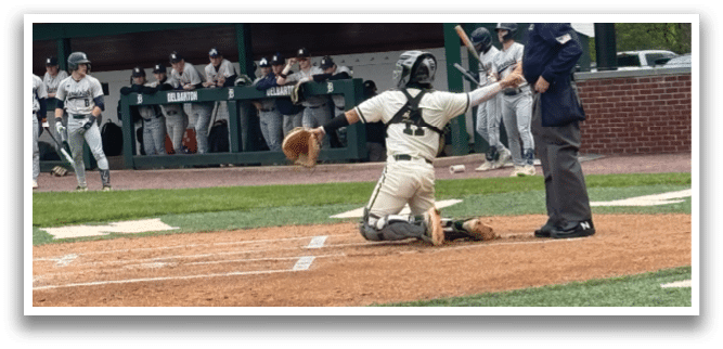 A baseball game is taking place with a batter, catcher, and umpire. Description generated by AI