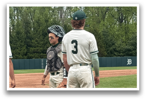 A baseball player wearing a number 3 jersey. Description generated by AI