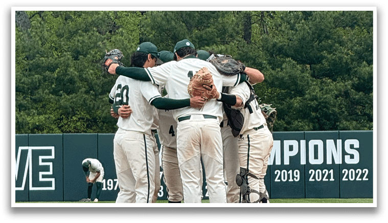 Baseball players on a field. Description generated by AI
