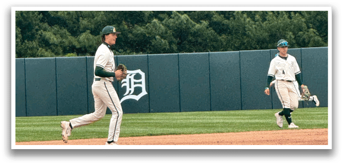 A baseball player running on the field. Description generated by AI