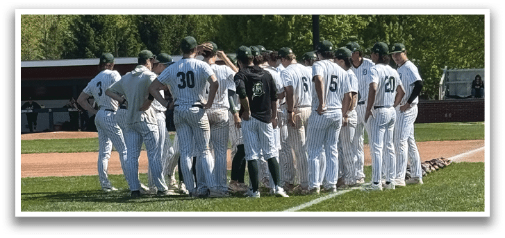 A group of baseball players on a field. Description generated by AI
