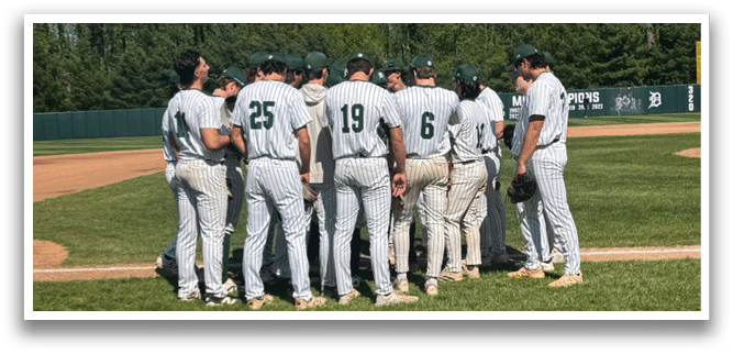 A group of baseball players standing on a field. Description generated by AI