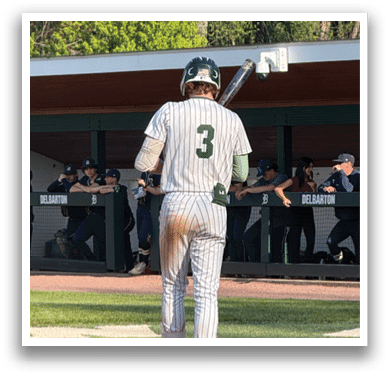 A baseball player with the number 3 on his jersey is standing at home plate with a bat. Description generated by AI