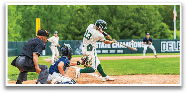 A baseball player is swinging a bat at a ball. Description generated by AI