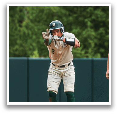 A baseball player is running to first base. Description generated by AI