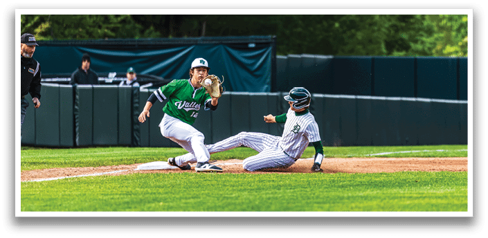 A baseball player slides into a base. Description generated by AI