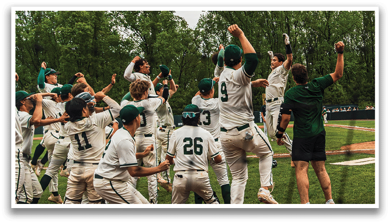 A group of baseball players celebrating a win. Description generated by AI
