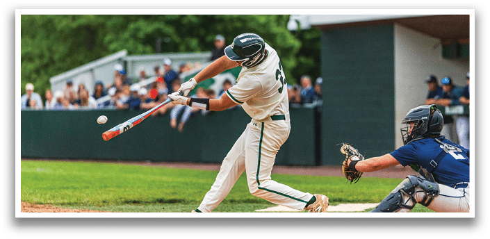 A baseball player is swinging a bat at a ball. Description generated by AI