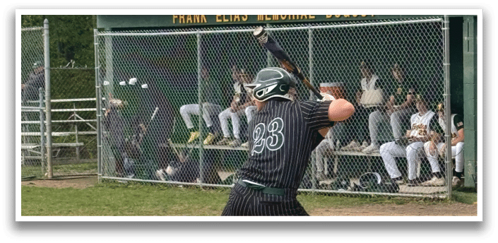 A baseball player is swinging a bat. Description generated by AI