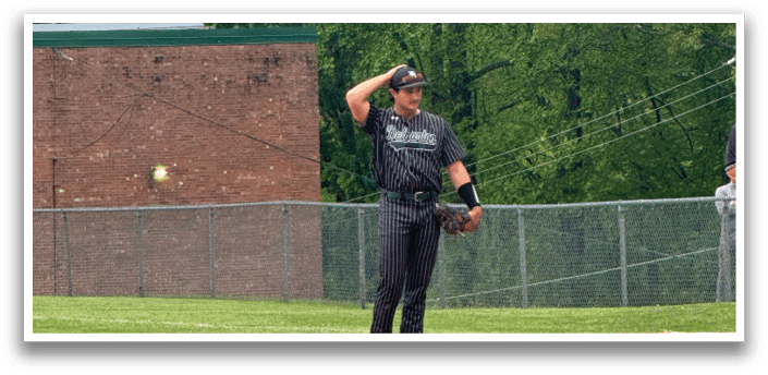A baseball player on the field. Description generated by AI