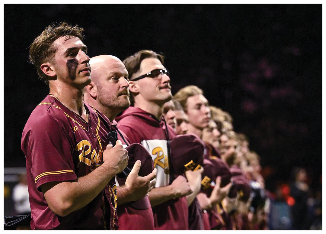 A group of football players on a field, one of them holding a football. AI generated content