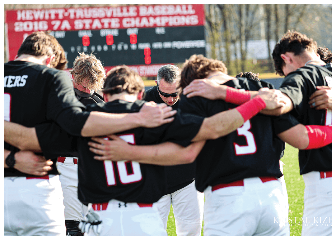 A group of baseball players huddled together on the field. AI generated content