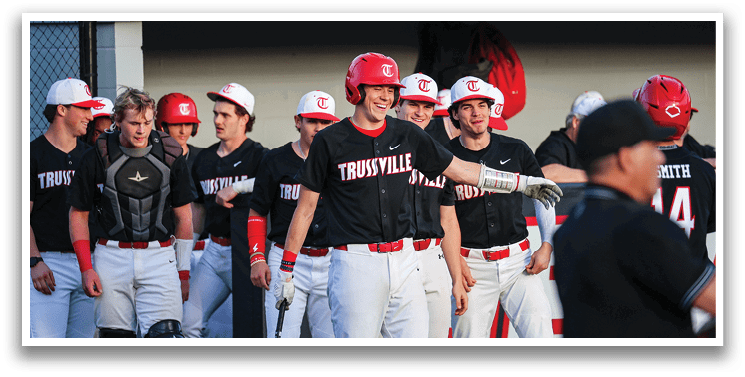 Baseball players wearing red helmets and black jerseys stand on the field. AI generated content