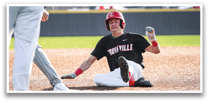 A baseball player slides into home base, wearing a red helmet and a black shirt. AI generated content